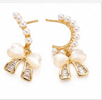 The Pearl Bow Crawler Earrings